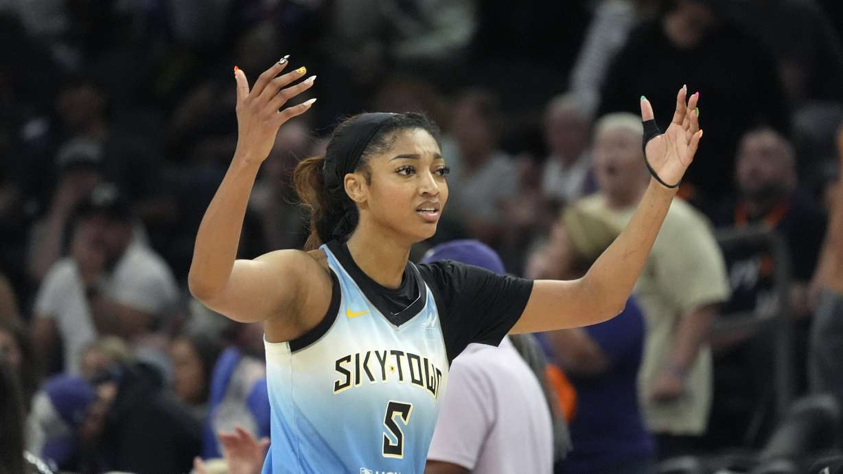 Chicago Sky forward Angel Reese walks to the bench during the second half of a WNBA basketball game against the Phoenix Mercury Thursday, Aug. 28, 2025, in Phoenix.