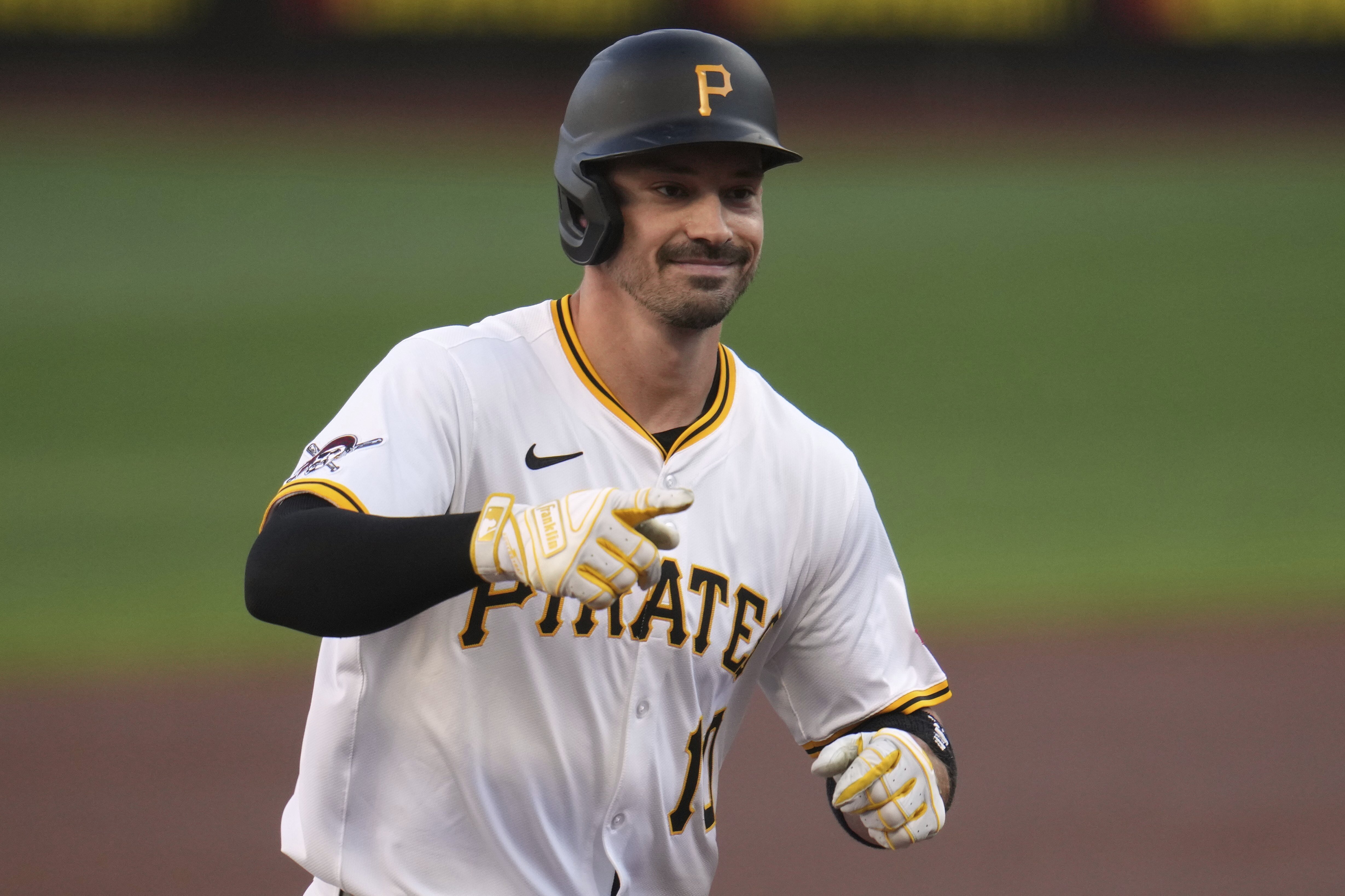 Pittsburgh Pirates' Bryan Reynolds celebrates as he rounds the bases after hitting a solo home run off Los Angeles Dodgers pitcher Emmet Sheehan during the first inning of a baseball game in Pittsburgh, Wednesday, Sept. 3, 2025. 