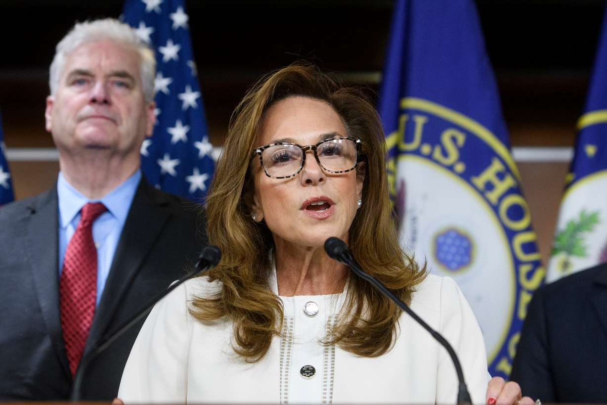 House Republican Conference Chairwoman Lisa McClain, R-Mich., is joined by House Majority Whip Tom Emmer, R-Minn., left, as she speaks during a news conference at the Capitol, May 6, in Washington.