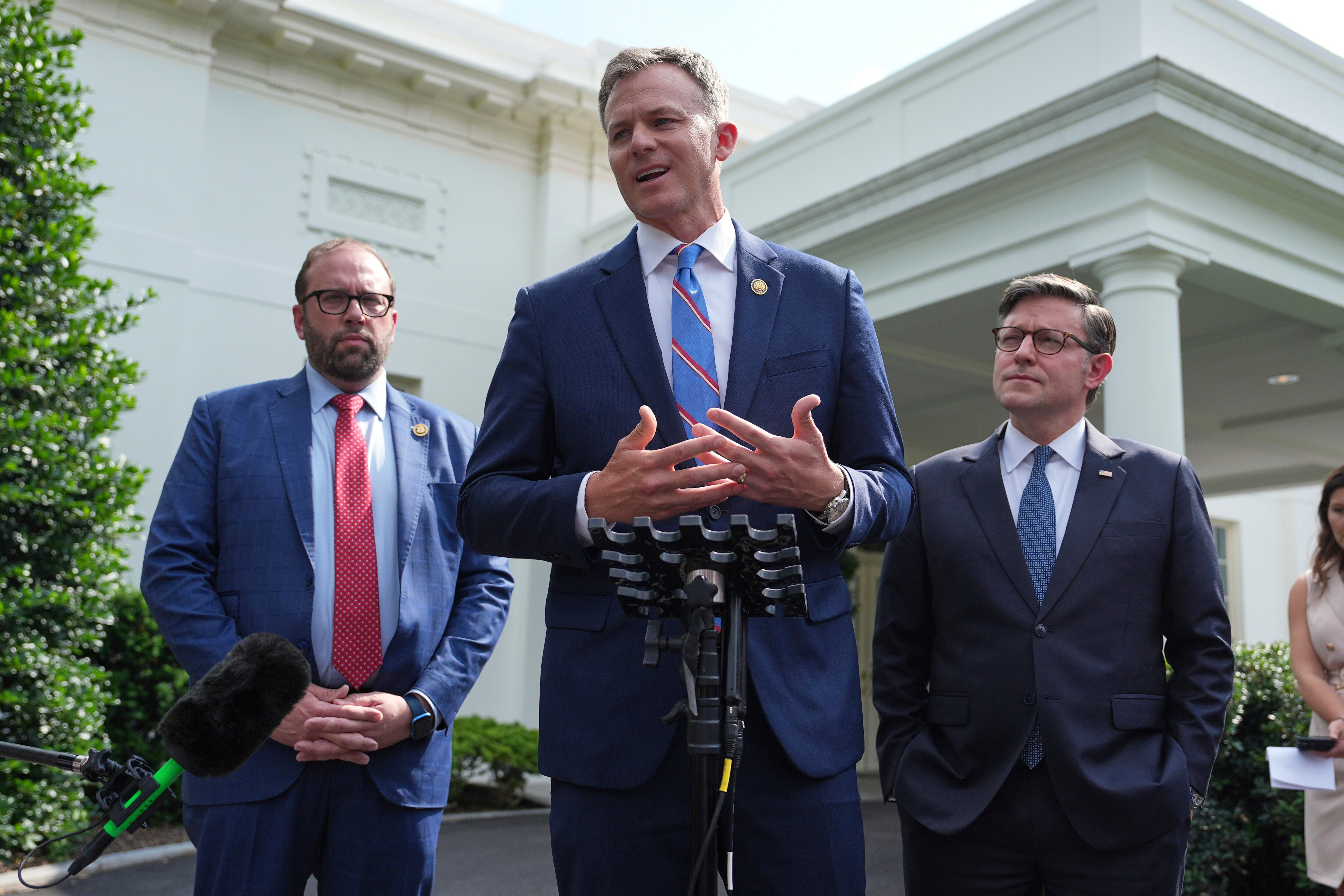 Rep. Blake Moore, R-Utah, speaks with members of the media as Rep. Jason Smith, R-Mo., left, and House Speaker Mike Johnson, R-La., listen outside the West Wing after an "Invest in America" roundtable with business leaders at the White House, June 9, in Washington.