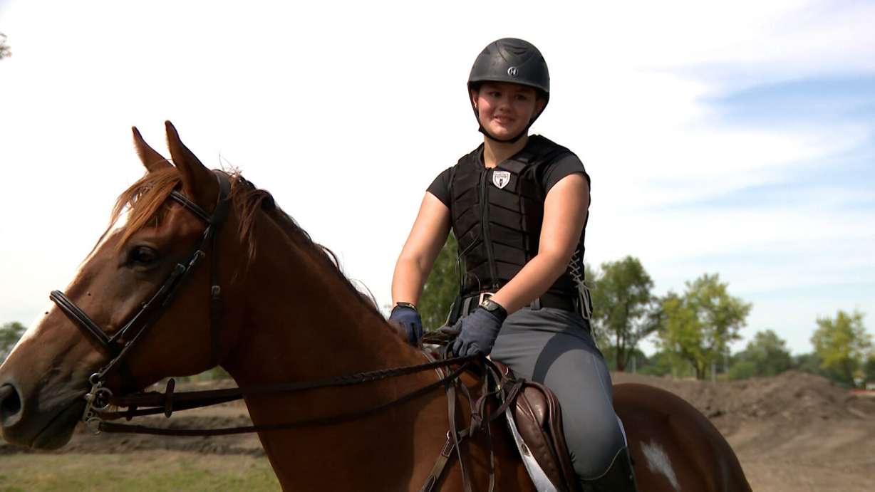 Caroline Mayer and her horse, Cheese, Wednesday. Mayer said it was hard to see the course get torn out.