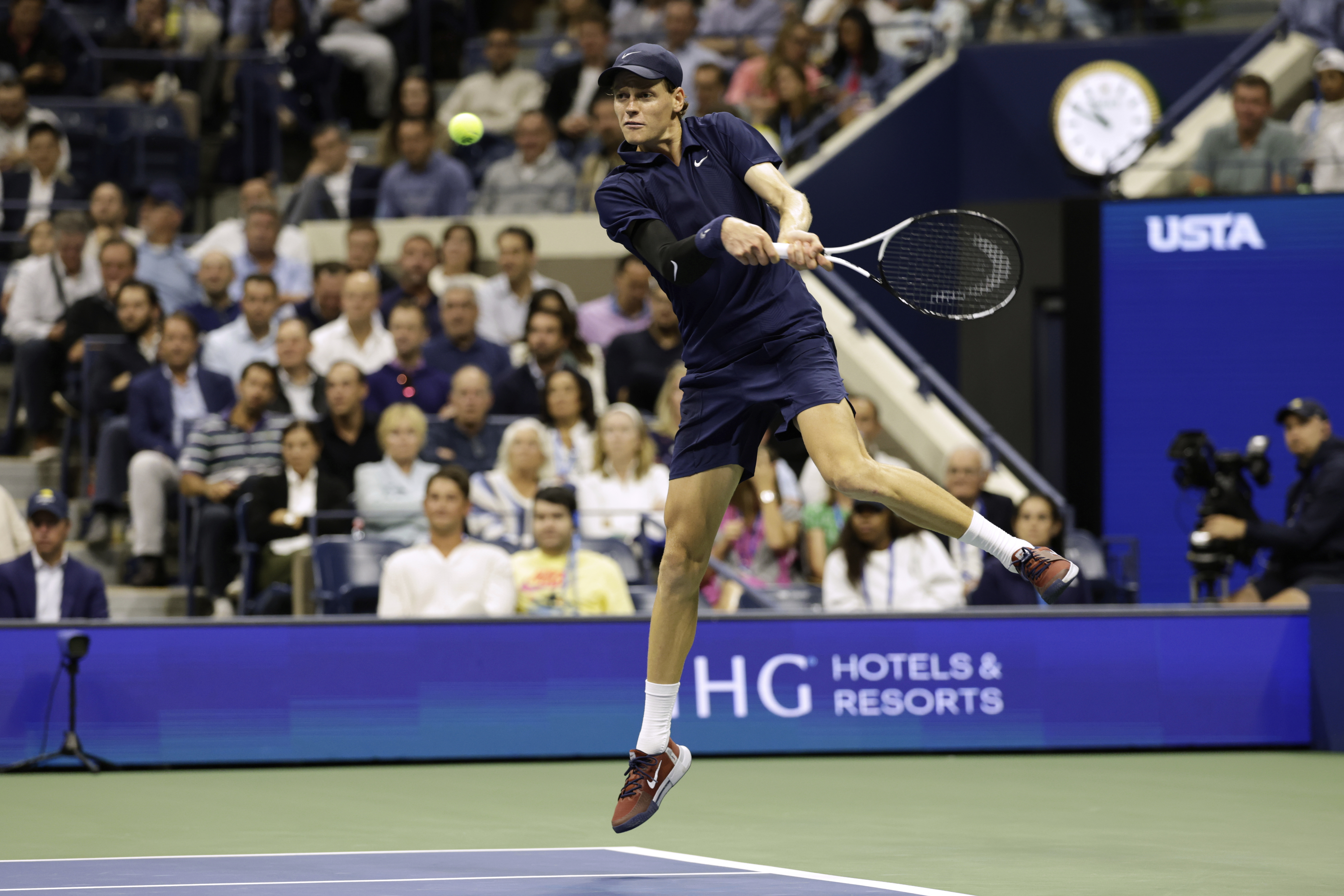 Jannik Sinner, of Italy, returns a shot to Lorenzo Musetti, of Italy, during the quarterfinal round of the U.S. Open tennis championships, Wednesday, Sept. 3, 2025, in New York. 