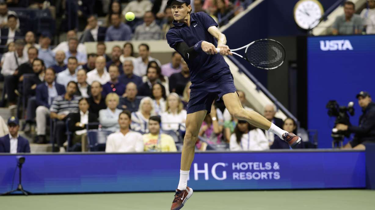 Jannik Sinner, of Italy, returns a shot to Lorenzo Musetti, of Italy, during the quarterfinal round of the U.S. Open tennis championships, Wednesday, Sept. 3, 2025, in New York.