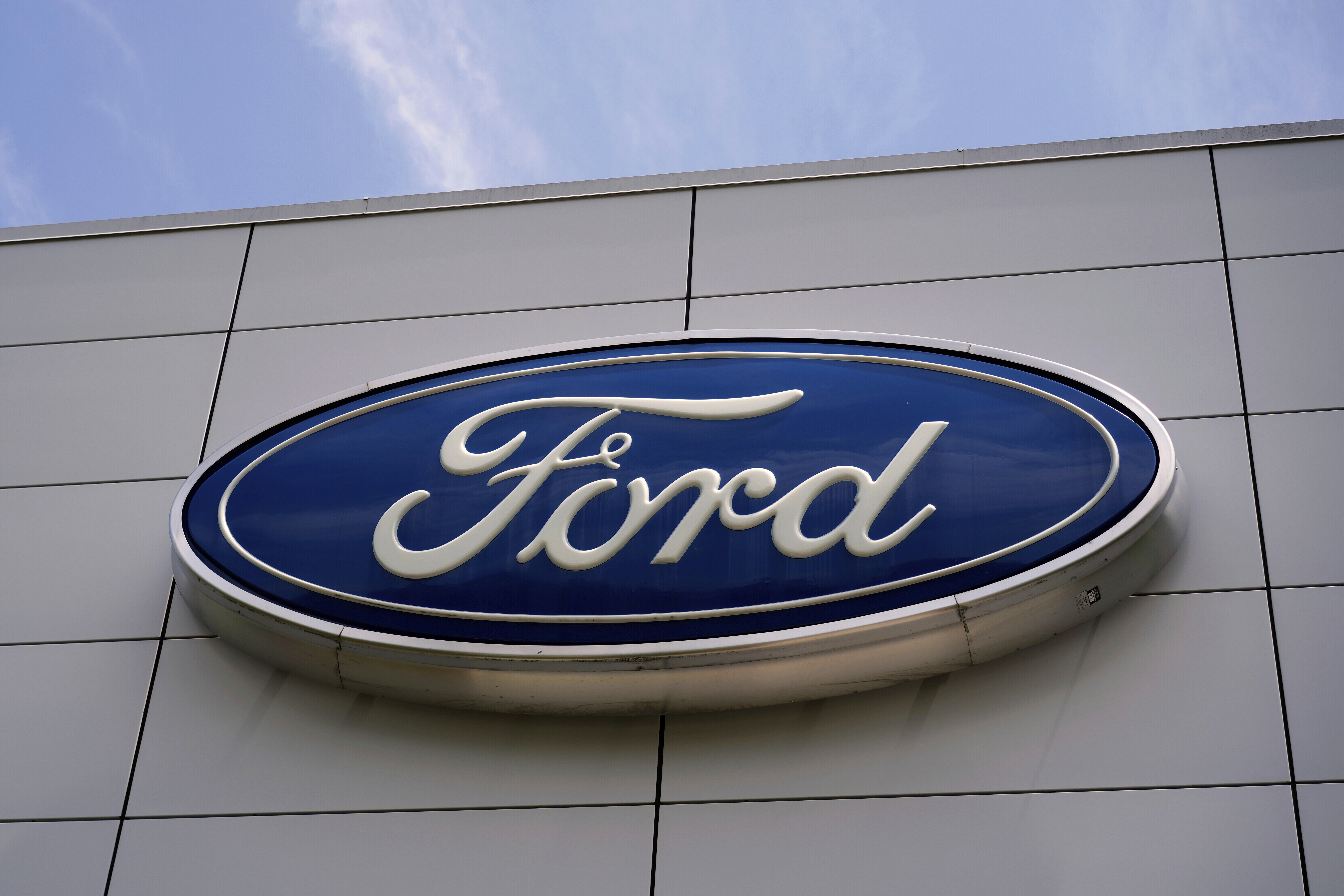 FILE - The Ford logo is seen above the entrance to the Ford Motor Company Kentucky Truck Plant, April 30, 2025, in Louisville, Ky. 