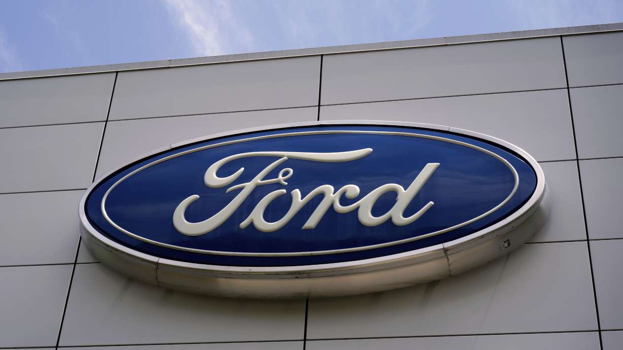 FILE - The Ford logo is seen above the entrance to the Ford Motor Company Kentucky Truck Plant, April 30, 2025, in Louisville, Ky.