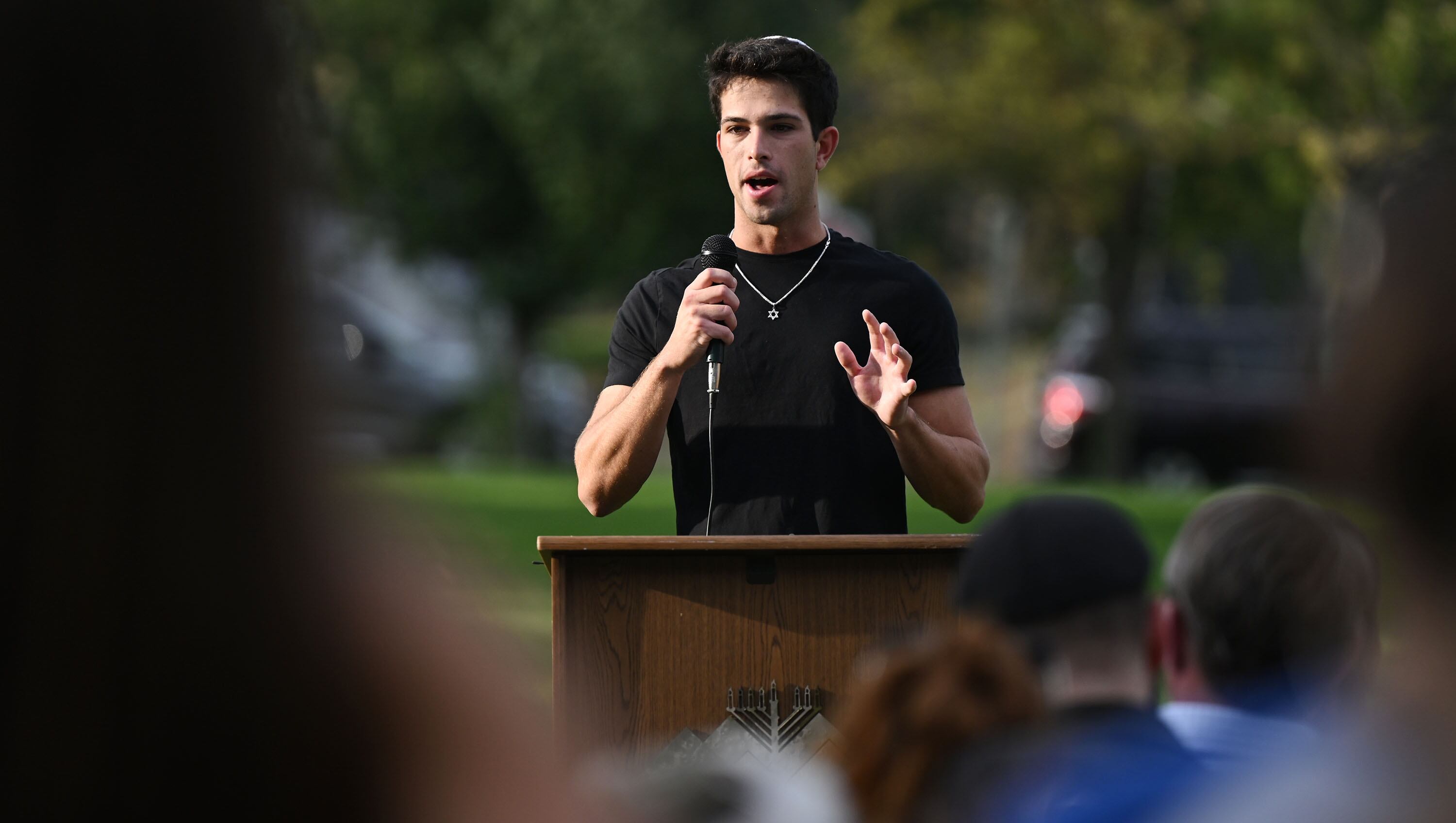 Henry Rade, president of the Chabad on Campus at the University of Utah, speaks at the grand opening of the Mel Meister Chabad Lounge on Wednesday. Rade said to have the house next to campus is "amazing."