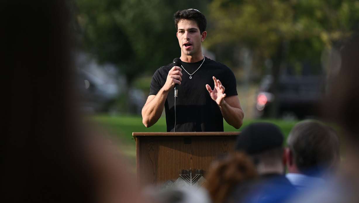 Henry Rade, president of the Chabad on Campus at the University of Utah, speaks at the grand opening of the Mel Meister Chabad Lounge on Wednesday. Rade said to have the house next to campus is "amazing."
