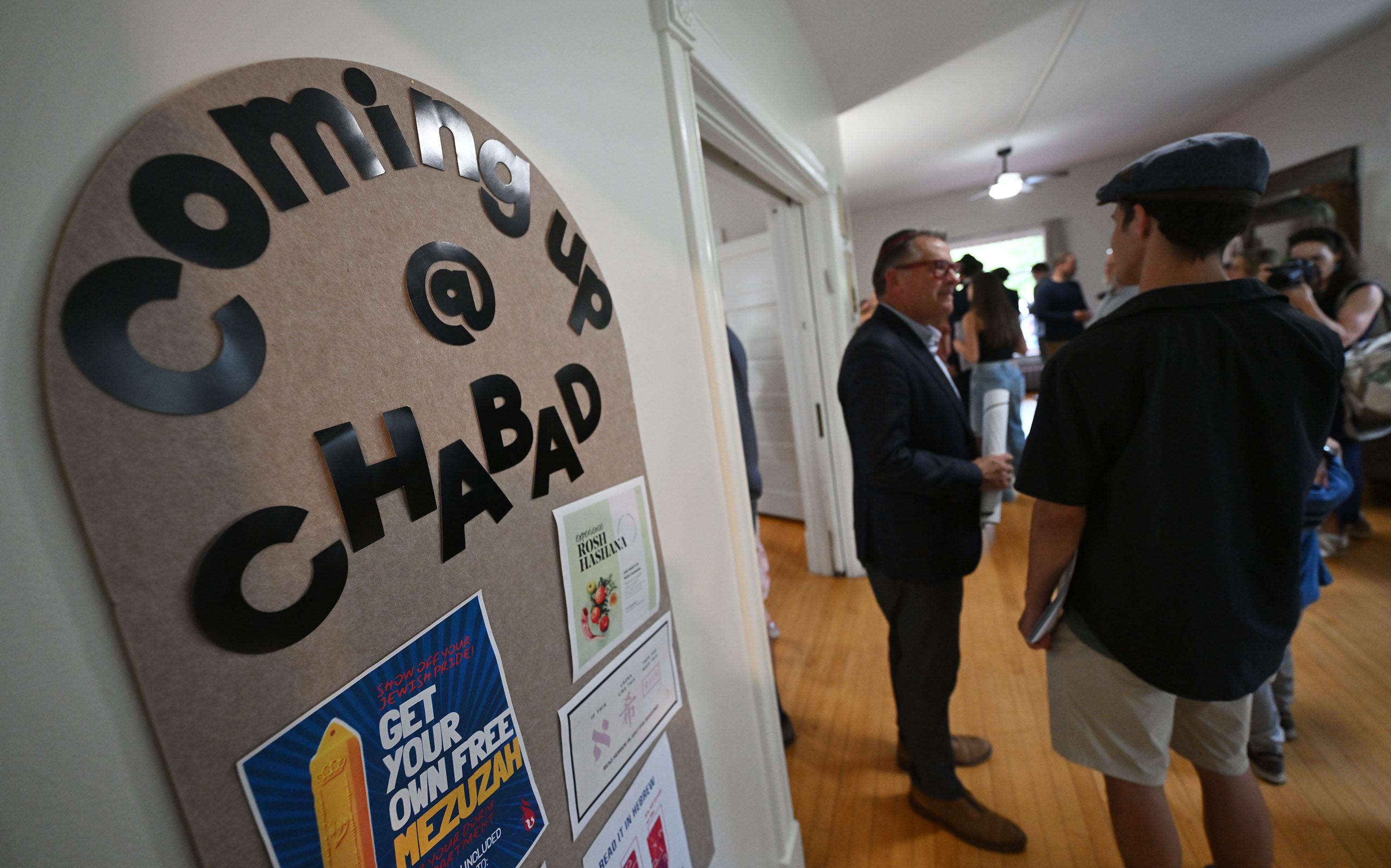 University of Utah President Taylor Randall with students at the grand opening of the Mel Meister Chabad Lounge, Wednesday. Randall said moments of faith like these "build the soul."