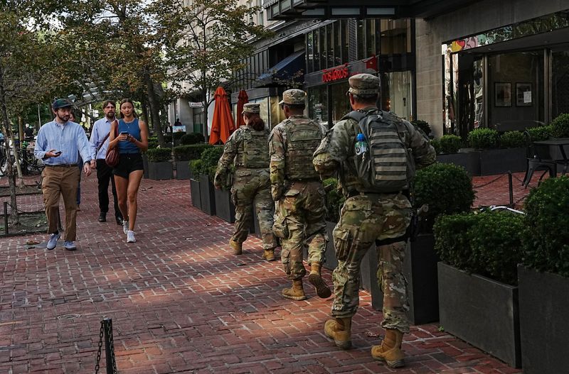 Members of the National Guard patrol near Dupont Circle weeks after President Donald Trump deployed the National Guard and ordered an increased presence of federal law enforcement in Washington, D.C., Sept. 2.