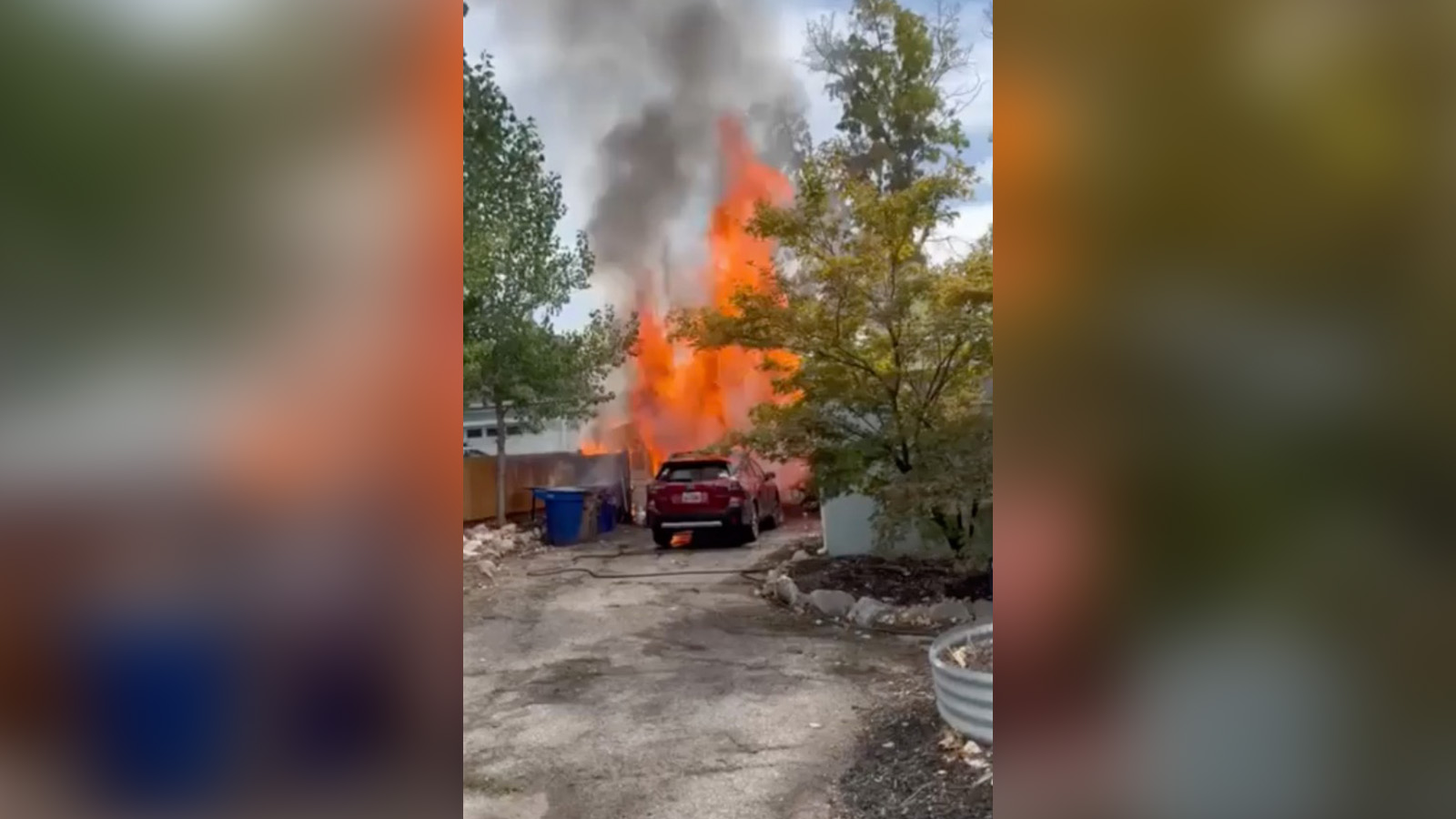 Flames erupt from a garage next to Blatch's BBQ in Salt Lake City on Wednesday. The restaurant says it will be closed "until further notice" after the fire damaged most of its equipment. 