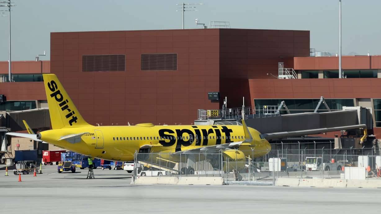 A Spirit Airlines plane is pictured at Salt Lake City International Airport in Salt Lake City on Oct. 31, 2023. The airline announced Thursday it's ending its Salt Lake City service on Oct. 2 as it restructures during bankruptcy.