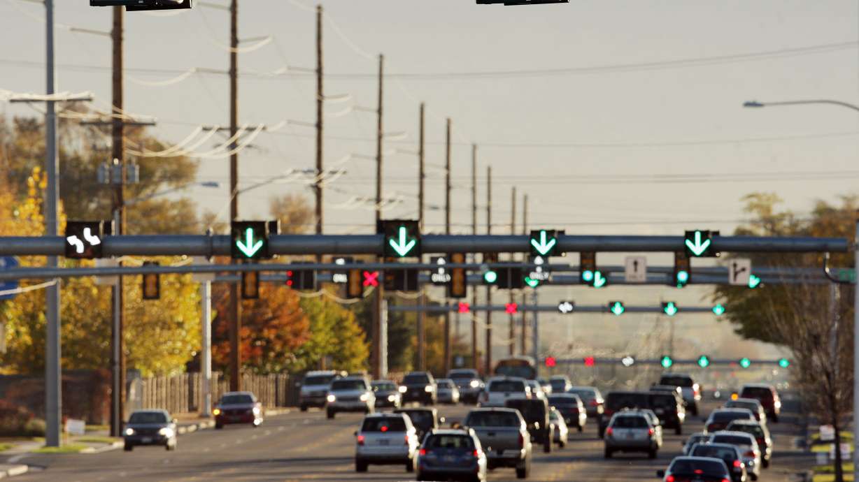 Cars drive on a flex lane system on 5400 South between Redwood Road and Bangerter Highway in Salt Lake County in 2012. UDOT is expanding Pioneer Crossing to include flex lanes with a project that starts Monday.
