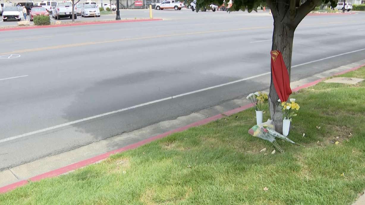 A memorial took shape near the intersection of 400 South and Main Street in Springville on Thursday in honor of a man hit and killed there the day before. Police called him a hero for pushing his wife out of the path of a wayward truck.