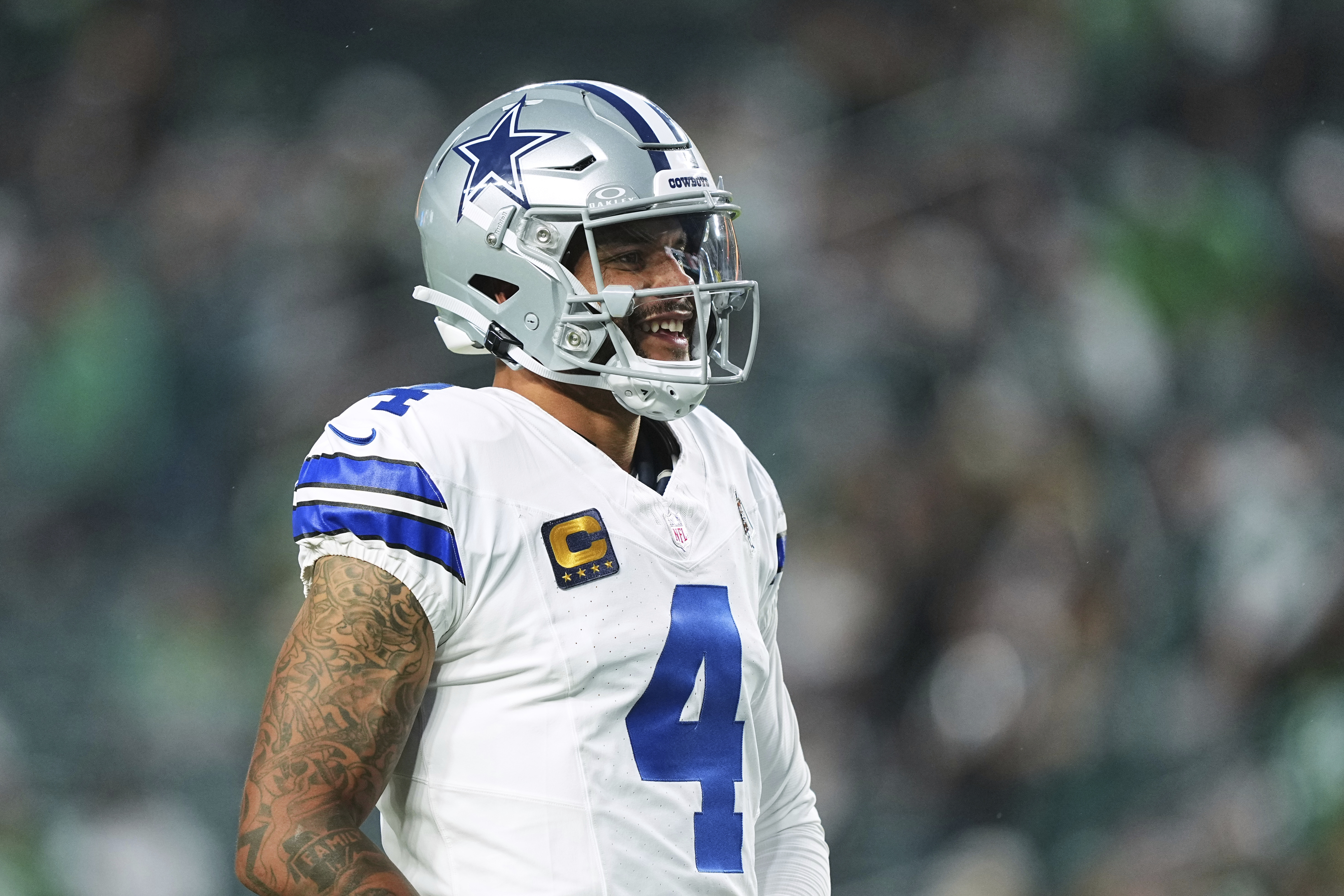 Dallas Cowboys quarterback Dak Prescott warms up before an NFL football game against the Philadelphia Eagles Thursday, Sept. 4, 2025, in Philadelphia.