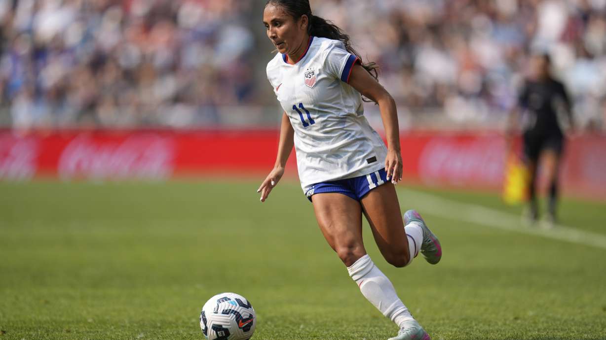 FILE - US midfielder Alyssa Thompson controls the ball during the first half of an international friendly soccer match against China, Saturday, May 31, 2025, in St. Paul, Minn.
