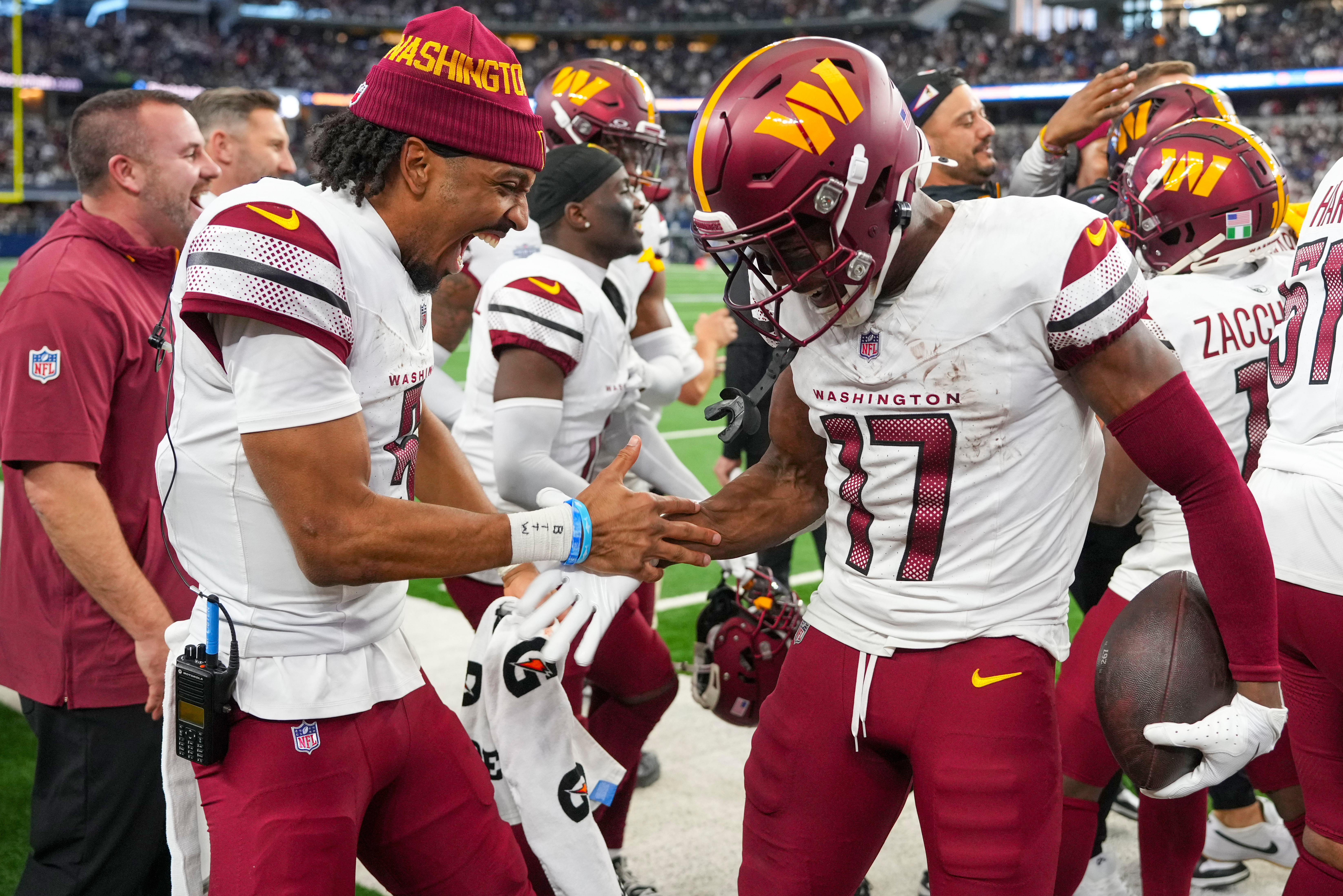 FILE - Washington Commanders wide receiver Terry McLaurin (17) celebrates with quarterback Jayden Daniels after scoring a touchdown during the second half of an NFL football game against the Dallas Cowboys, Jan. 5, 2025, in Arlington, Texas. 