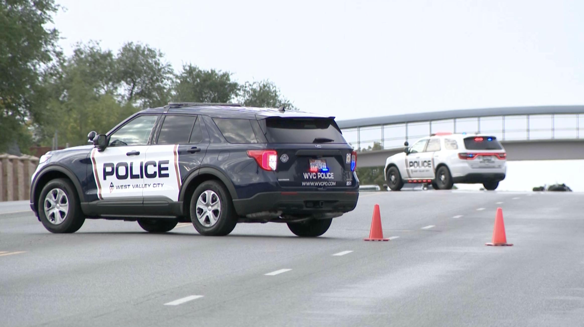 Police investigate after a motorcycle collided with a car on 5600 West near 5000 South in West Valley City on Friday. The motorcycle rider was critically injured.