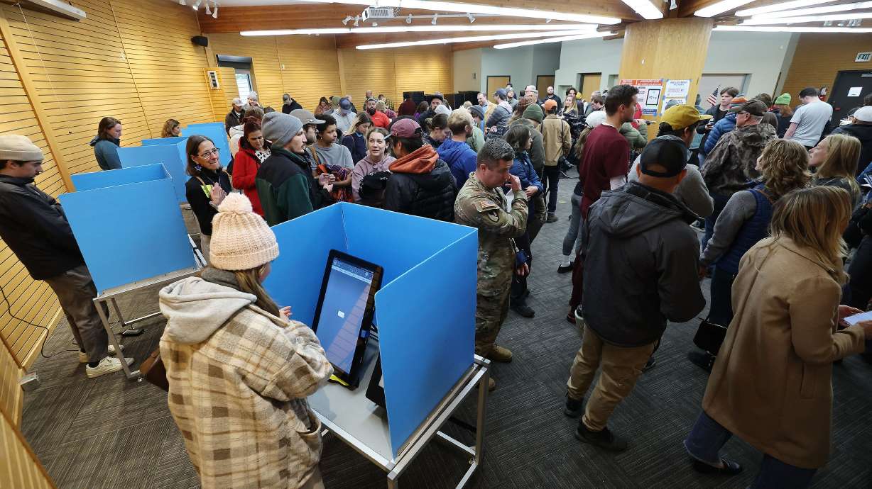 Voters stand in line at Hogle Zoo in Salt Lake City on Nov. 5, 2024. The Utah delegation has remained relatively quiet as the state Legislature begins the process of redrawing its congressional map.