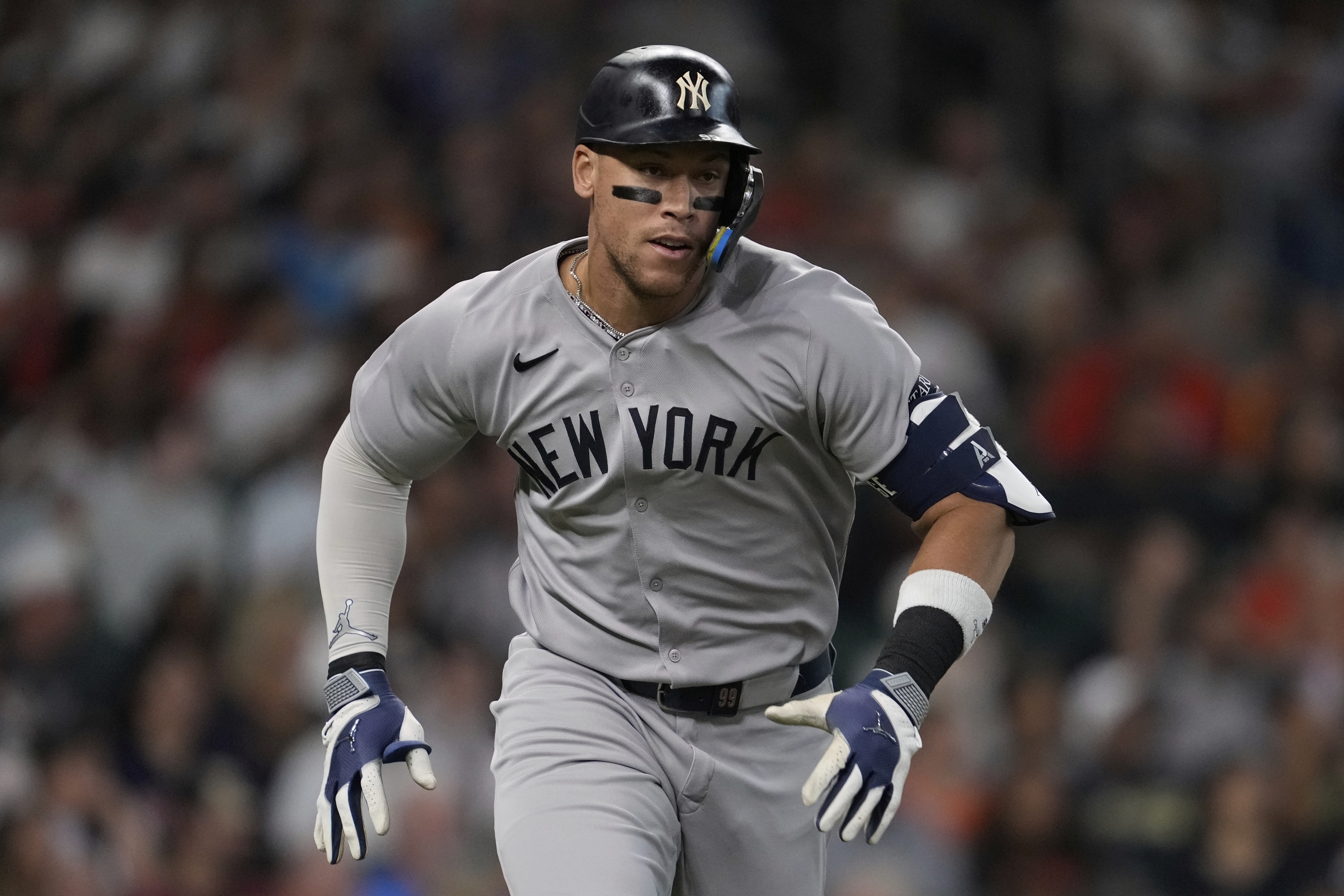 New York Yankees designated hitter Aaron Judge runs on a single during the first inning of a baseball game against the Houston Astros in Houston, Tuesday, Sept. 2, 2025. 