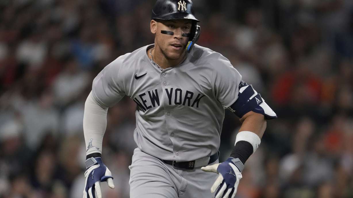 New York Yankees designated hitter Aaron Judge runs on a single during the first inning of a baseball game against the Houston Astros in Houston, Tuesday, Sept. 2, 2025.