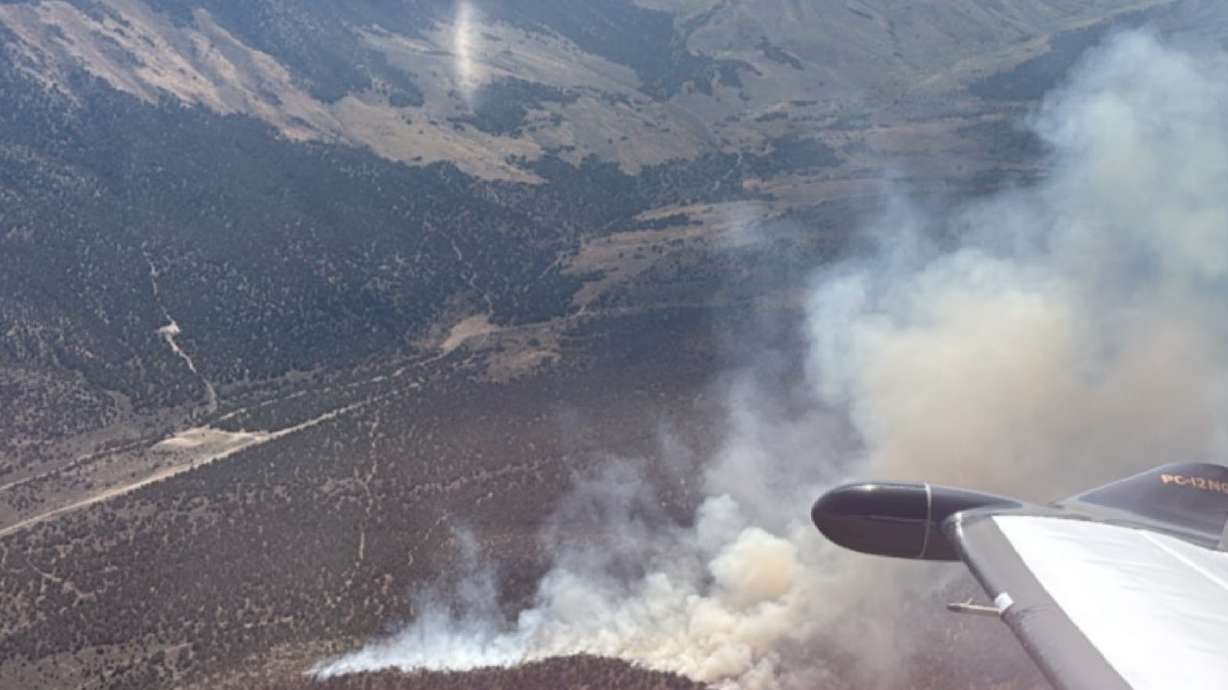 The Bismark Fire burns in western Utah County on Friday. The fire had burned 50 acres Friday afternoon, as Utah's fire season remains active.