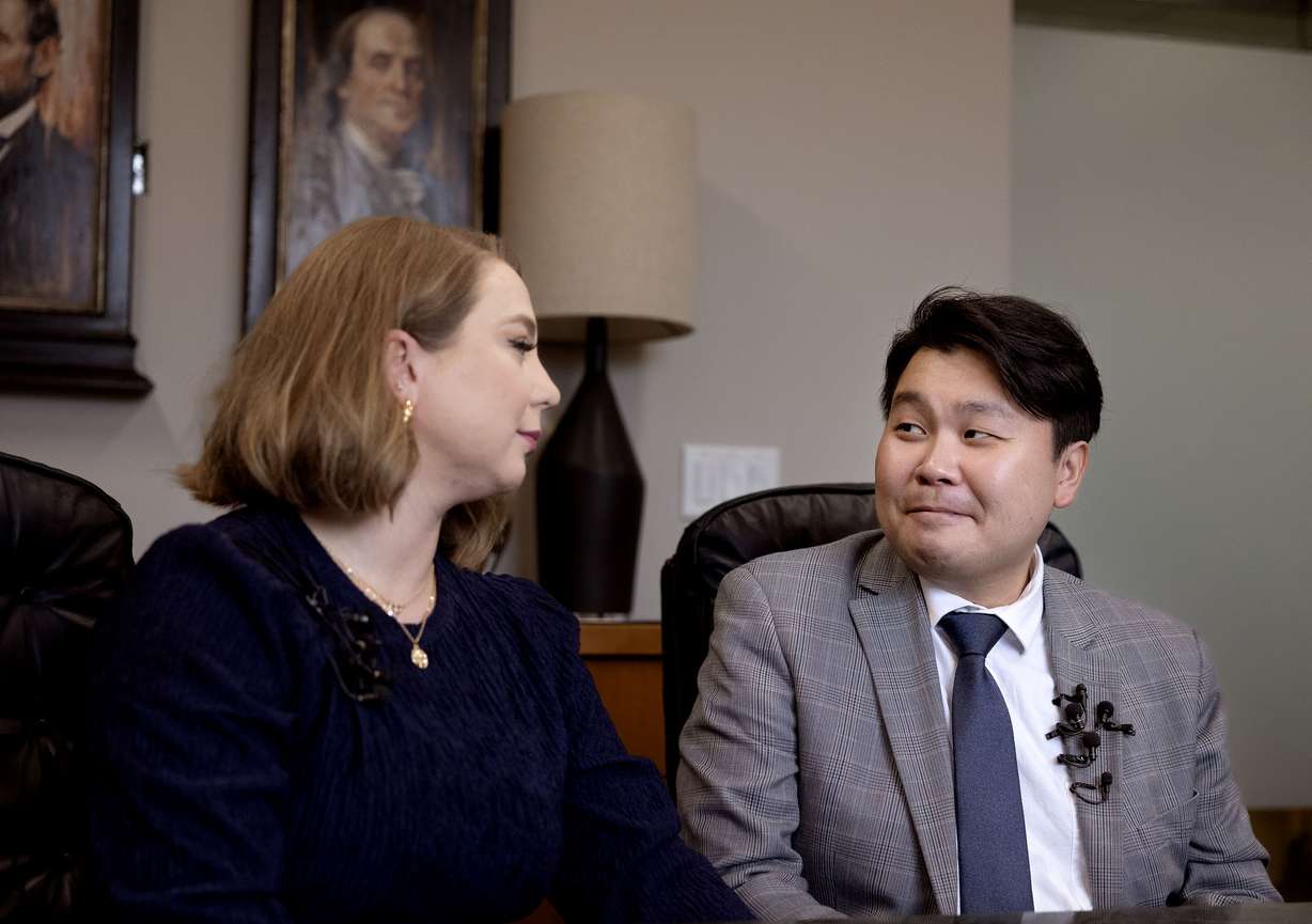 DaNae Snow and her husband, John Shin, speak at a press conference at the law office of Adam Crayk in Millcreek on Friday. Shin spoke about his detainment at an immigration detention facility in Aurora, Colo.