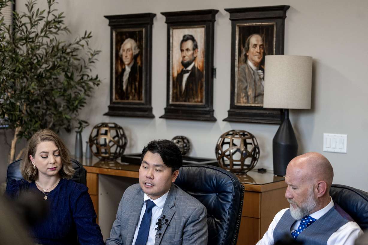 DaNae Snow, John Shin and attorney Adam Crayk speak to the media at Crayk's offices in Millcreek on Friday.