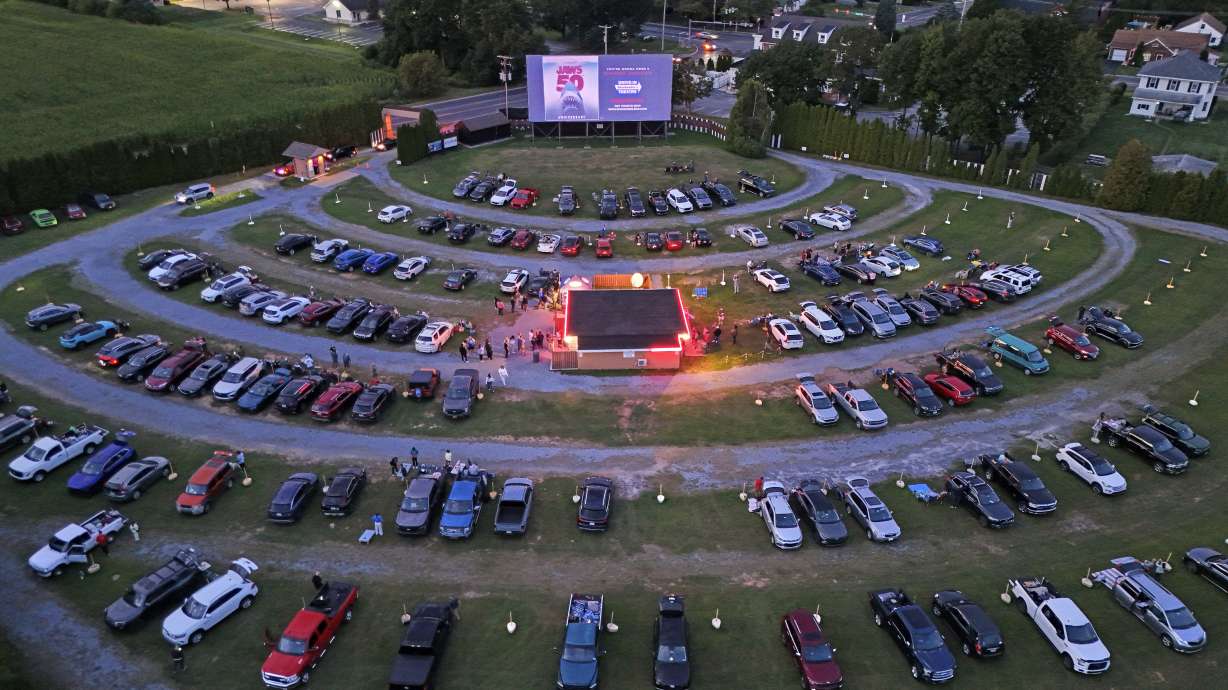 The sunsets on the Shankweiler Drive-In as previews run before the feature film "Jaws" in Orefield, Pa., Aug. 29.