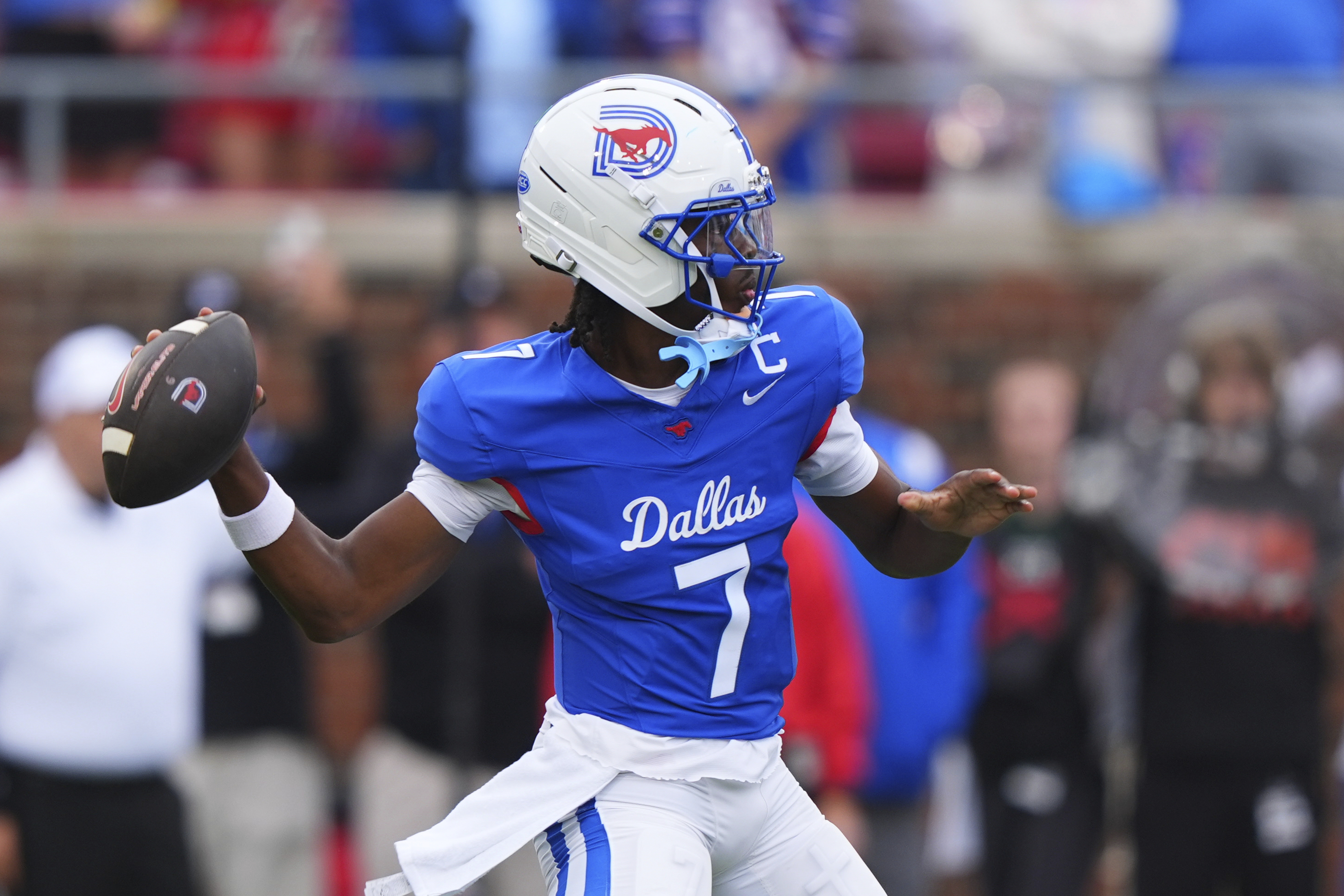 SMU quarterback Kevin Jennings throws a pass during the first half of an NCAA college football game against Baylor, Saturday, Sept. 6, 2025, in Dallas. 