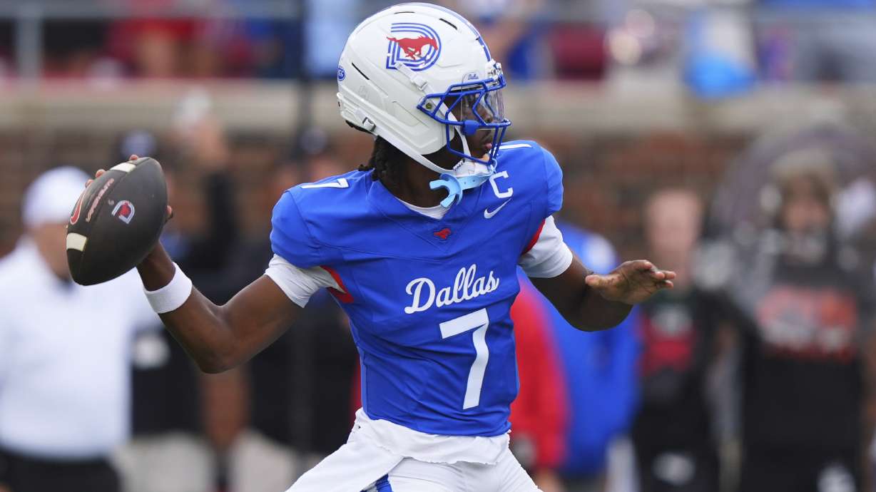 SMU quarterback Kevin Jennings throws a pass during the first half of an NCAA college football game against Baylor, Saturday, Sept. 6, 2025, in Dallas.