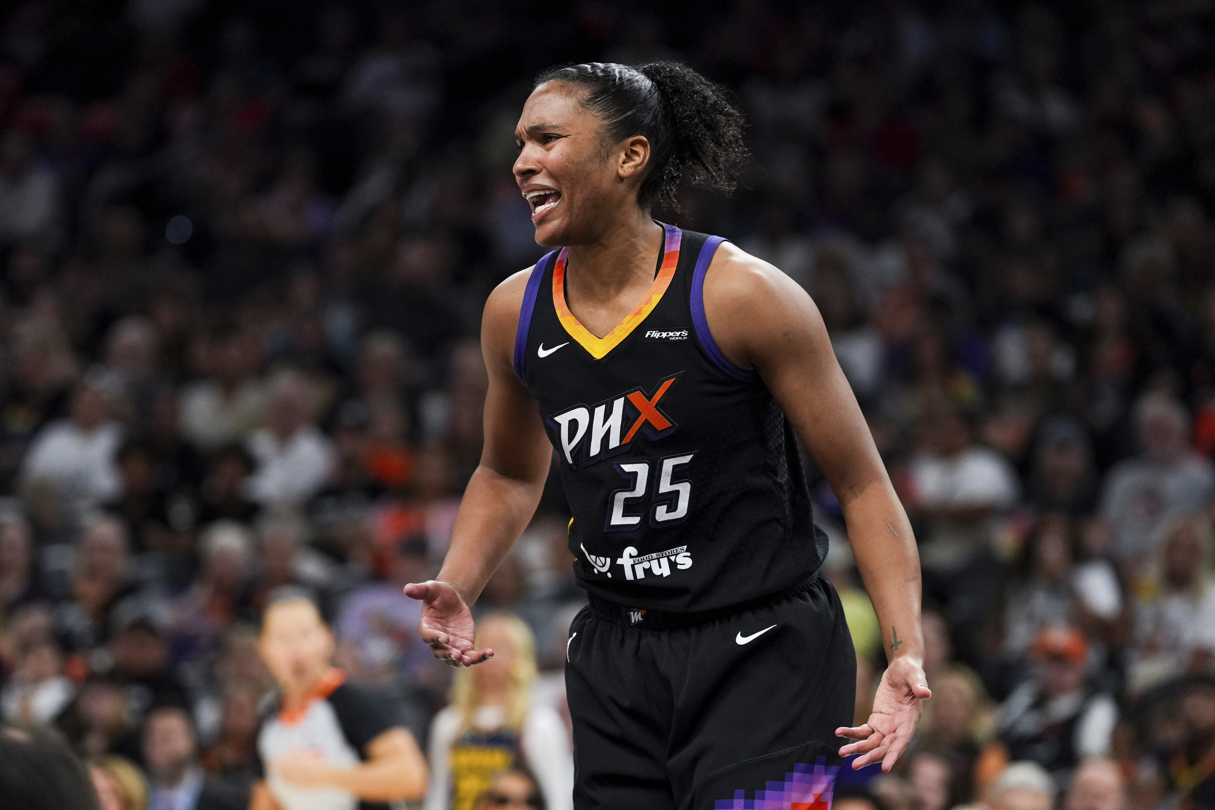 Phoenix Mercury forward Alyssa Thomas (25) reacts to a play during the second half of a WNBA basketball game against the Indiana Fever, Tuesday, Sept. 2, 2025, in Phoenix. 