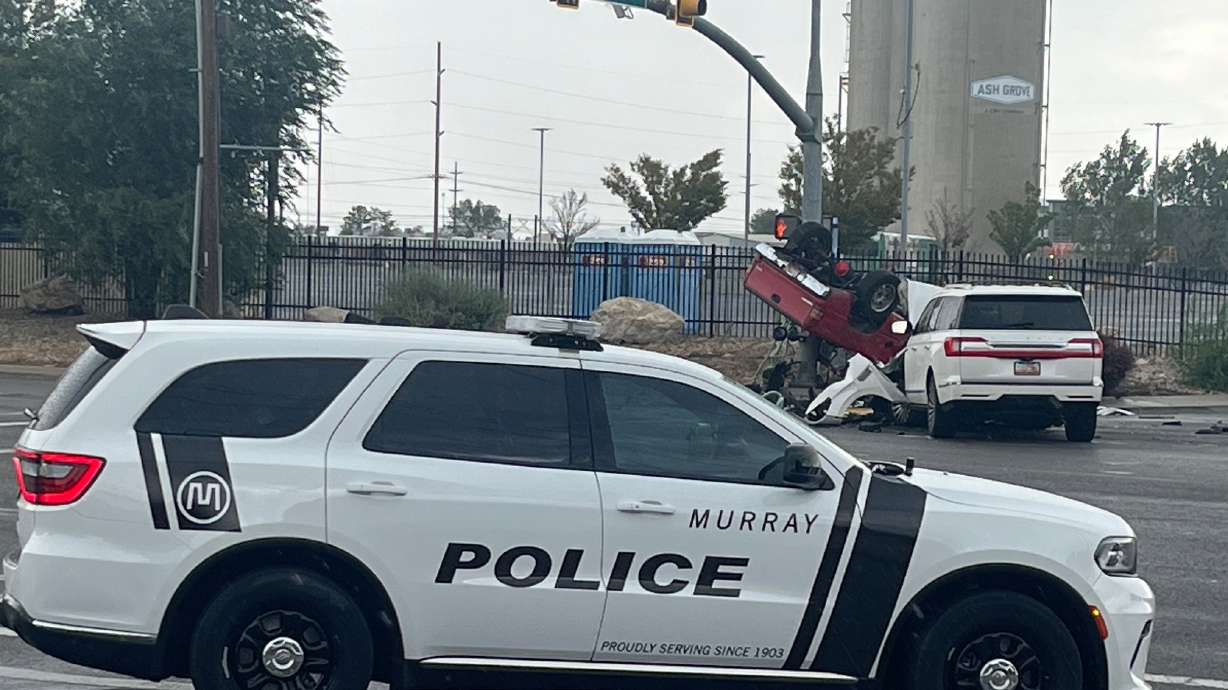 One person died and others suffered minor injuries after a truck collided with an SUV and rolled in Murray on Saturday.