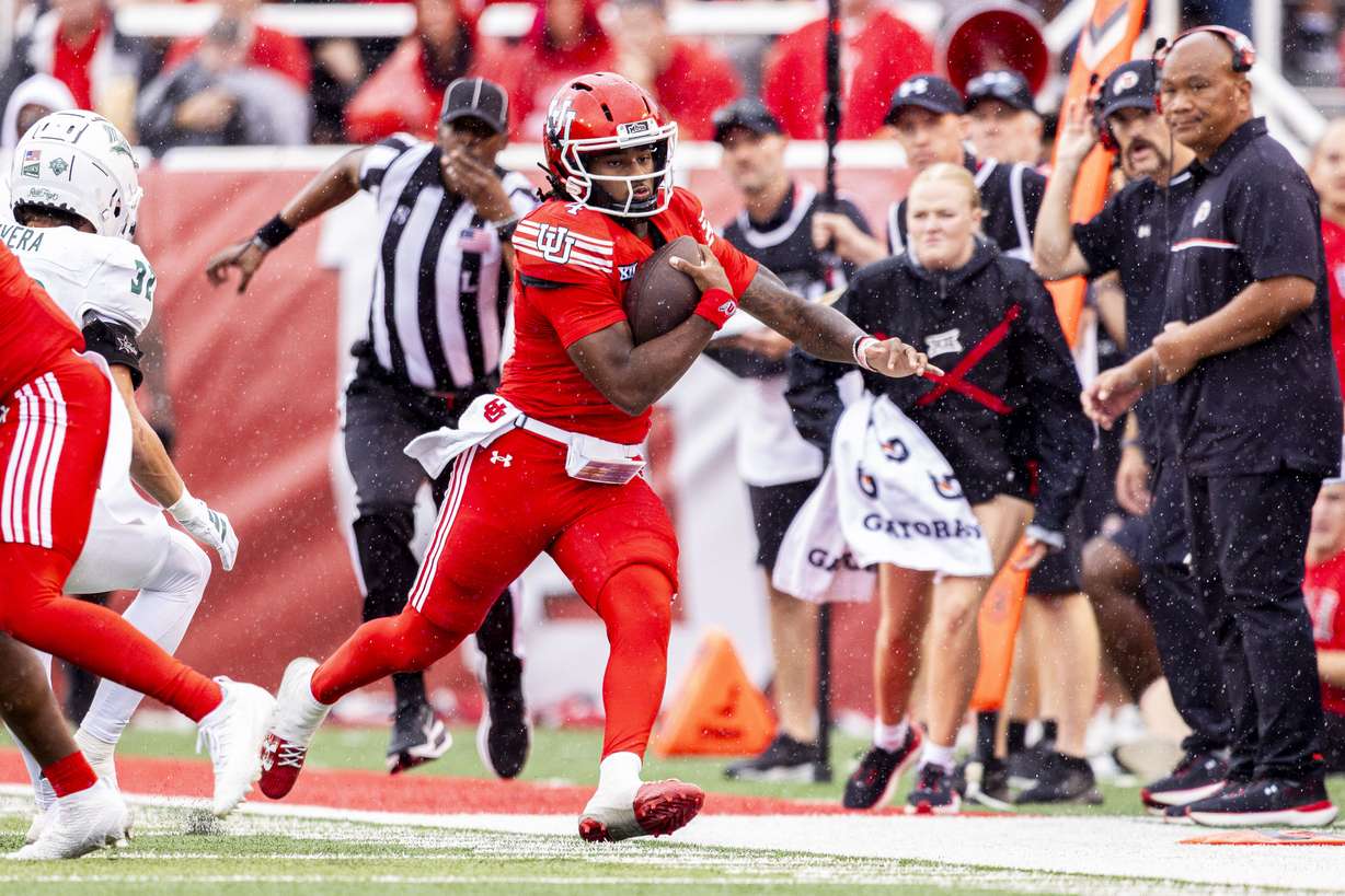Utah Utes quarterback Devon Dampier (4) runs the ball during an NCAA football game between the University of Utah Utes and the California Polytechnic State University Mustangs held at Rice-Eccles Stadium in Salt Lake City on Saturday, Sept. 6, 2025.