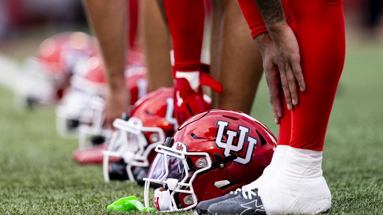 Utah Utes players stretch before an NCAA football game between the University of Utah Utes and the California Polytechnic State University Mustangs held at Rice-Eccles Stadium in Salt Lake City on Saturday, Sept. 6, 2025.