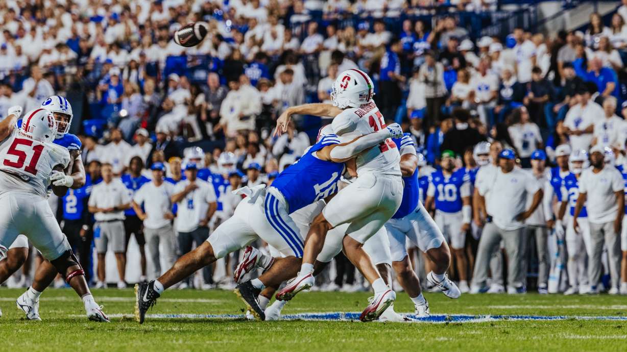 BYU linebacker Isaiah Glasker sacks Stanford quarterback Ben Gulbranson during the first half of an NCAA football game, Saturday, Sept. 6, 2025 at LaVell Edwards Stadium in Provo, Utah.