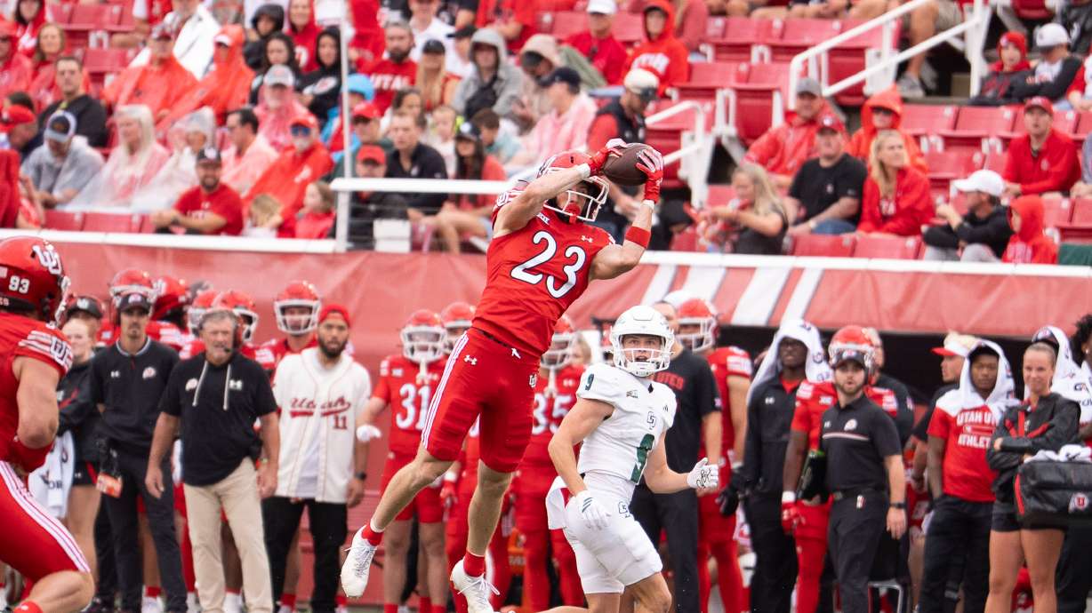 Utah defensive back Jackson Bennee picks off a Cal Poly pass and returns it for a touchdown on Sept. 6, 2025.
