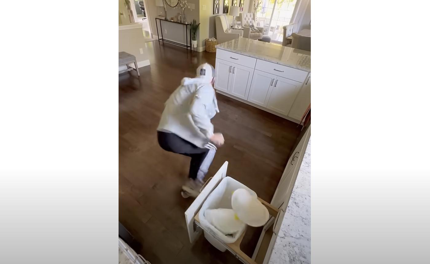 Daniel LaBelle mid-sprint-clean—proving that even dusting can look like Olympic-level sport.