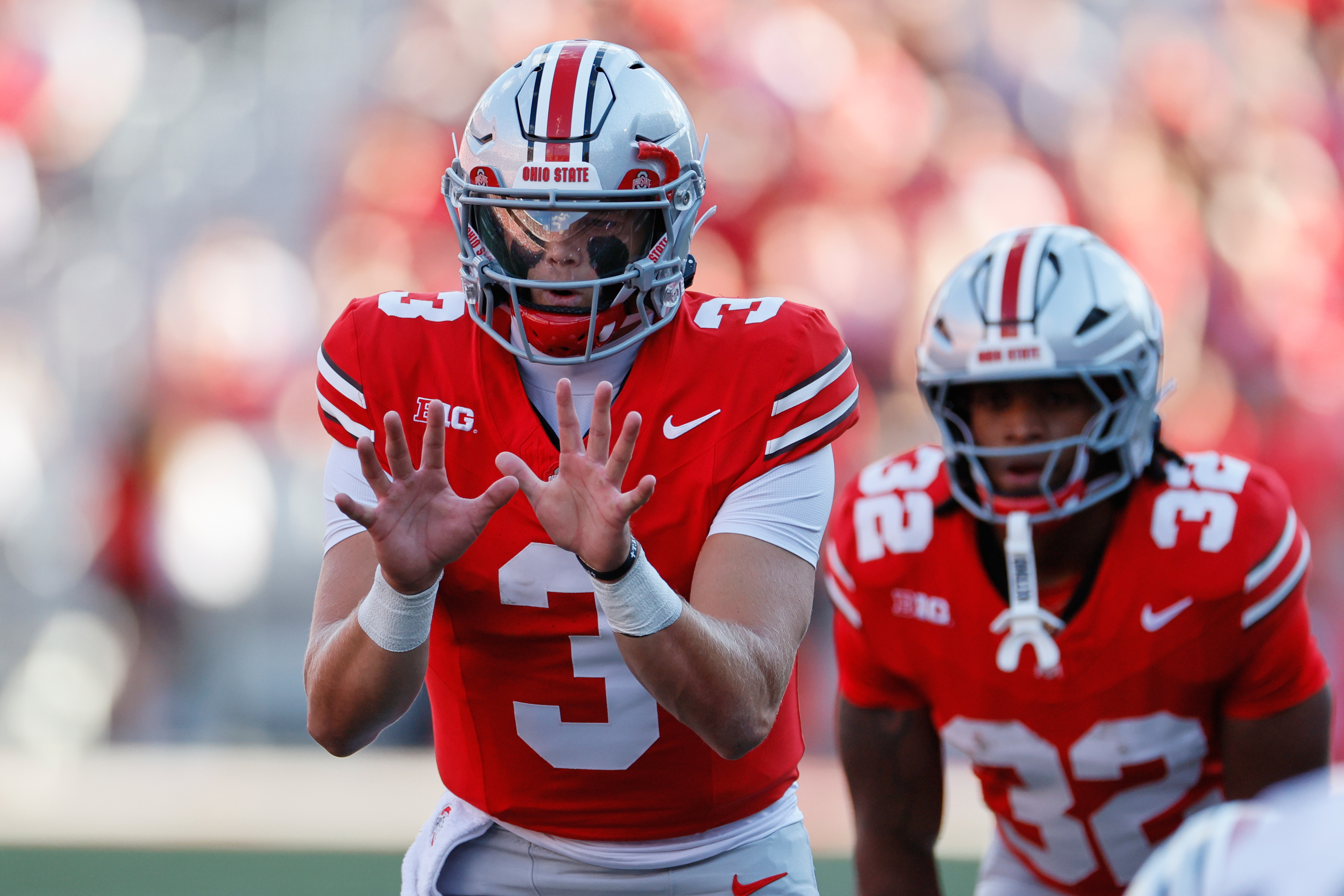 Ohio State quarterback Lincoln Kienholz takes a snap against Grambling State during the second half of an NCAA college football game, Saturday, Sept. 6, 2025, in Columbus, Ohio. 