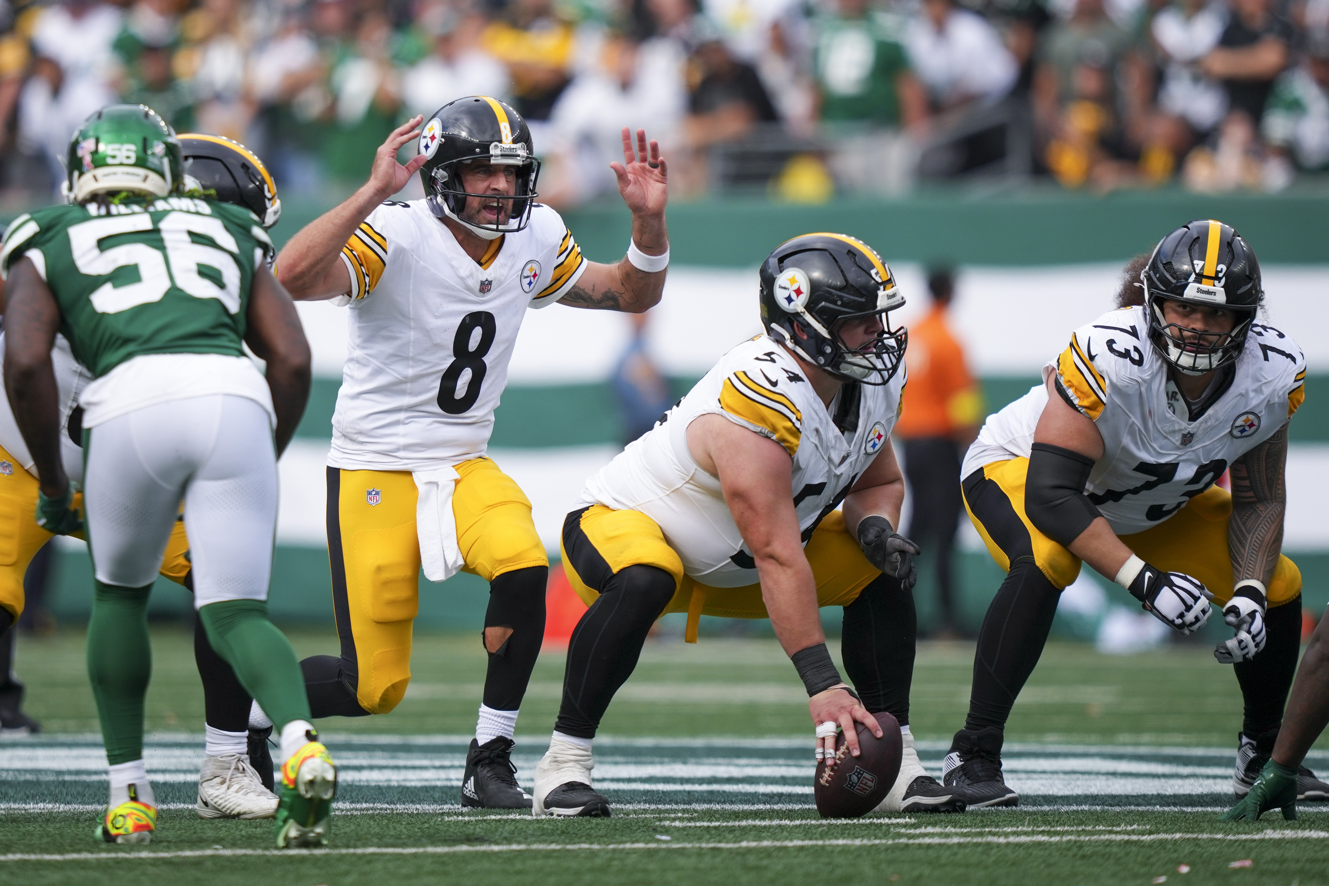 Pittsburgh Steelers quarterback Aaron Rodgers (8) calls a play before the snap against the New York Jets during the second half of an NFL football game Sunday, Sept. 7, 2025, in East Rutherford, N.J. 