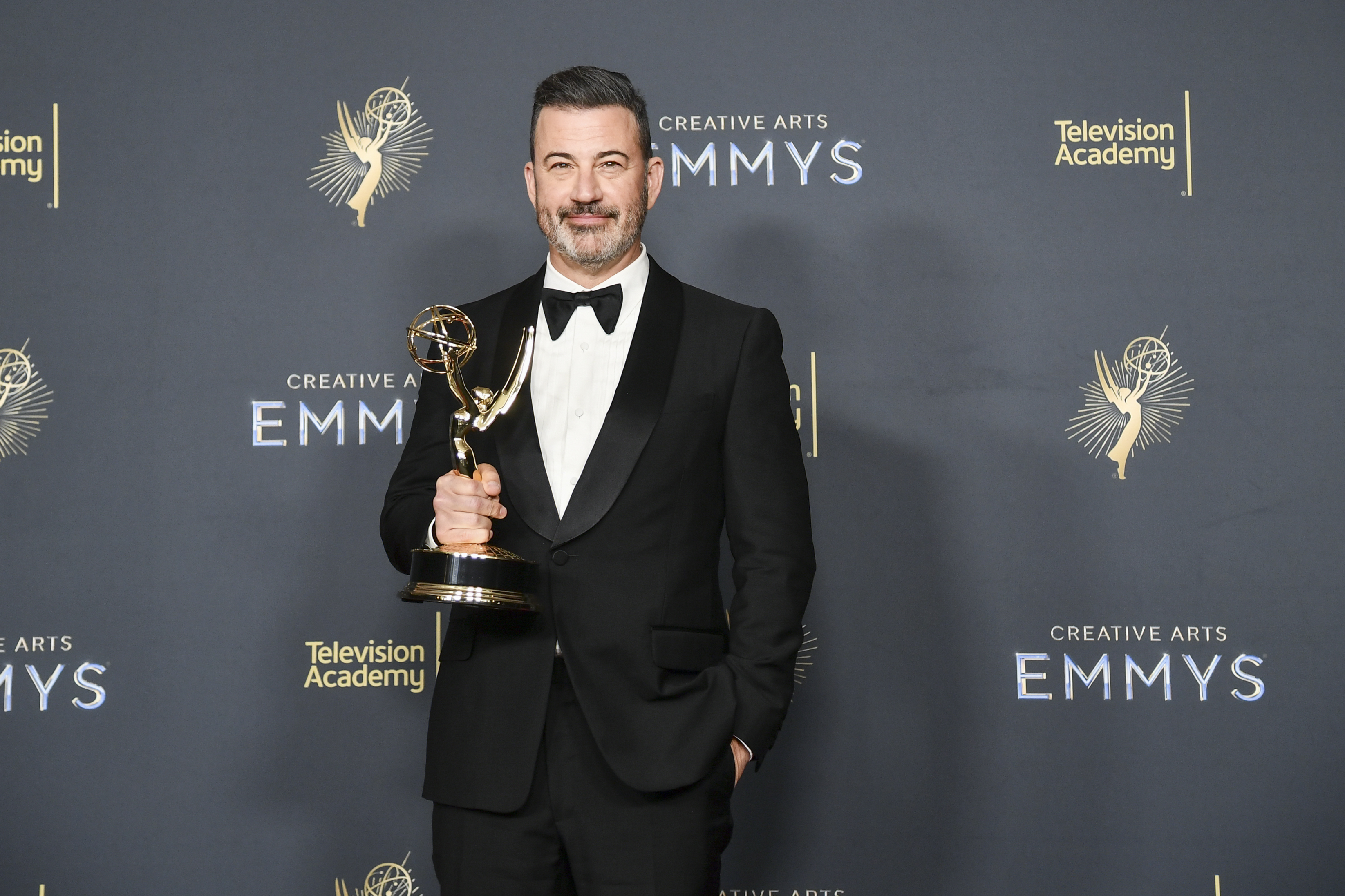 Jimmy Kimmel poses in the press room with the award for host for a game show for "Who Wants to Be a Millionaire" during night two of the Creative Arts Emmy Awards on Sunday, Sept. 7, 2025, at the Peacock Theater in Los Angeles. 