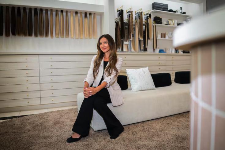 Lacy Gadegaard-West, CEO of Laced Hair Extensions, poses at her store’s headquarters ahead of the Laced Hair Foundation’s fourth annual Hair for Hope Gala, a charity gala to give away hair extensions to women in need in Salt Lake City on Tuesday.