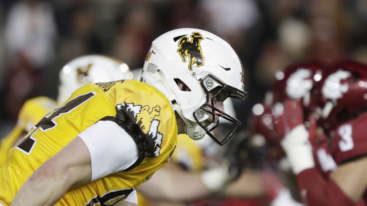 Wyoming tight end John Michael Gyllenborg (84) runs a route during the second half of an NCAA college football game against Washington State, Saturday, Nov. 30, 2024, in Pullman, Wash.