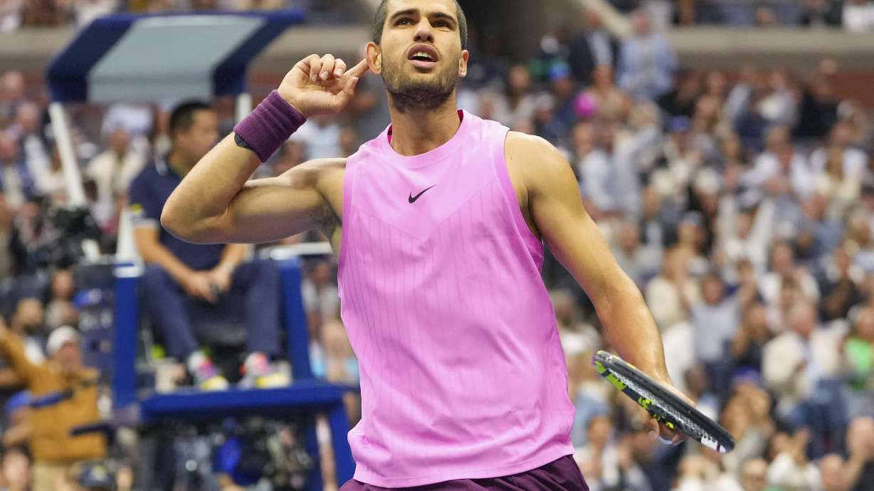 Carlos Alcaraz, of Spain, reacts after scoring a point against Jannik Sinner, of Italy, during the men's singles final of the U.S. Open tennis championships, Sunday, Sept. 7, 2025, in New York.