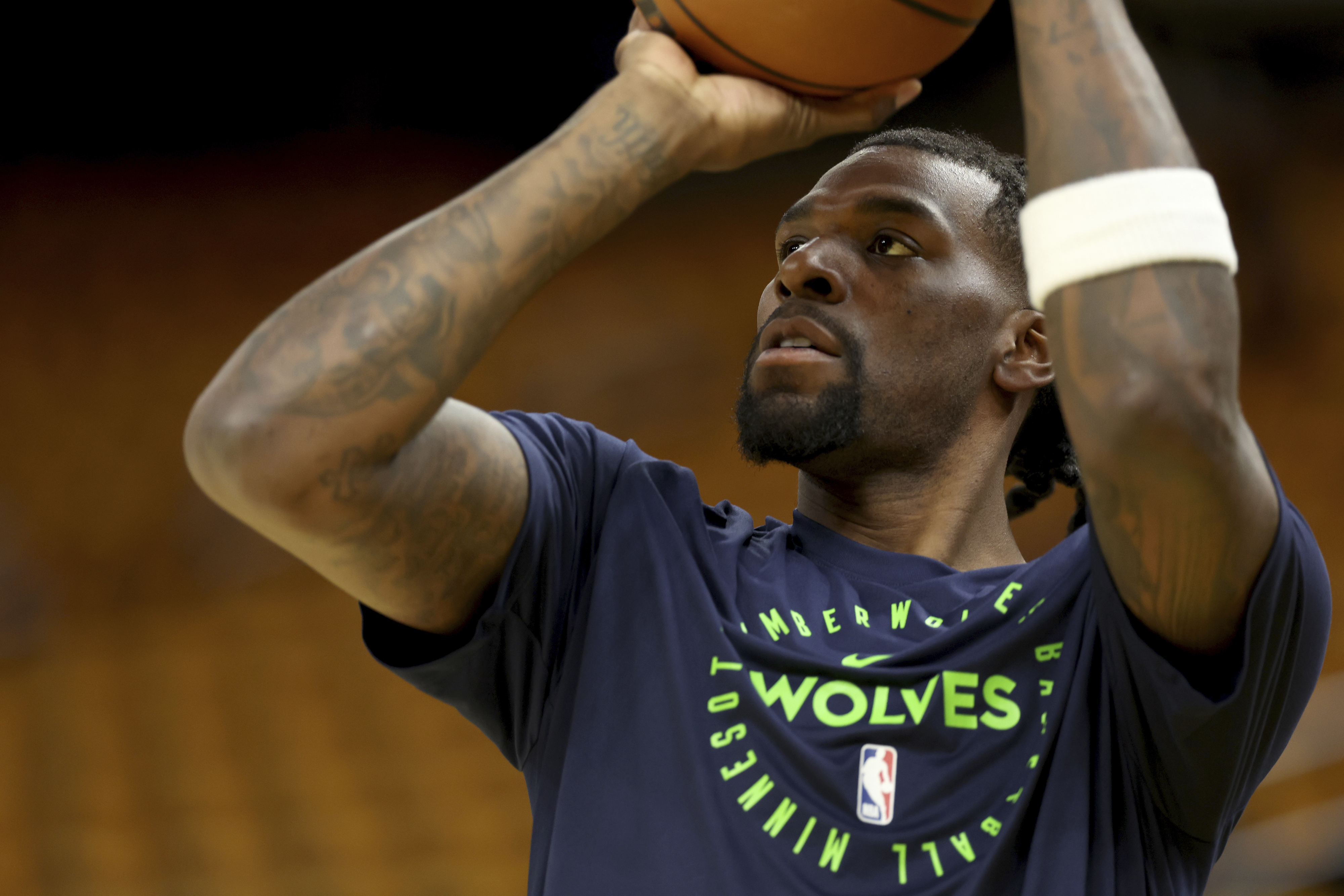 FILE - Minnesota Timberwolves center Naz Reid warms up prior to Game 4 in the Western Conference semifinals of the NBA basketball playoffs against the Golden State Warriors, Monday, May 12, 2025, in San Francisco. 