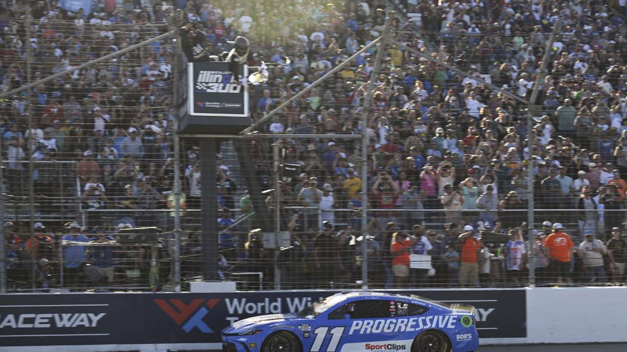 Denny Hamlin (11) wins a NASCAR Cup Series auto race at World Wide Technology Raceway, Sunday, Sept. 7, 2025, in Madison, Ill.