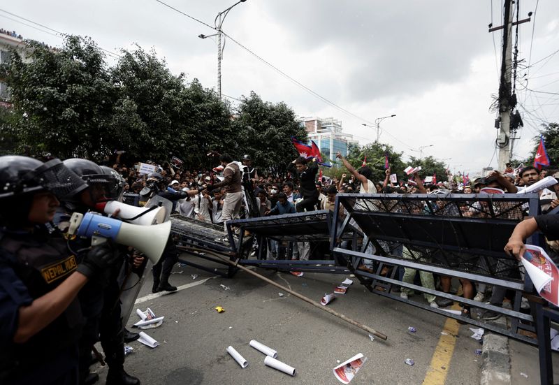 Young anti-corruption protesters oust Nepal PM Oli