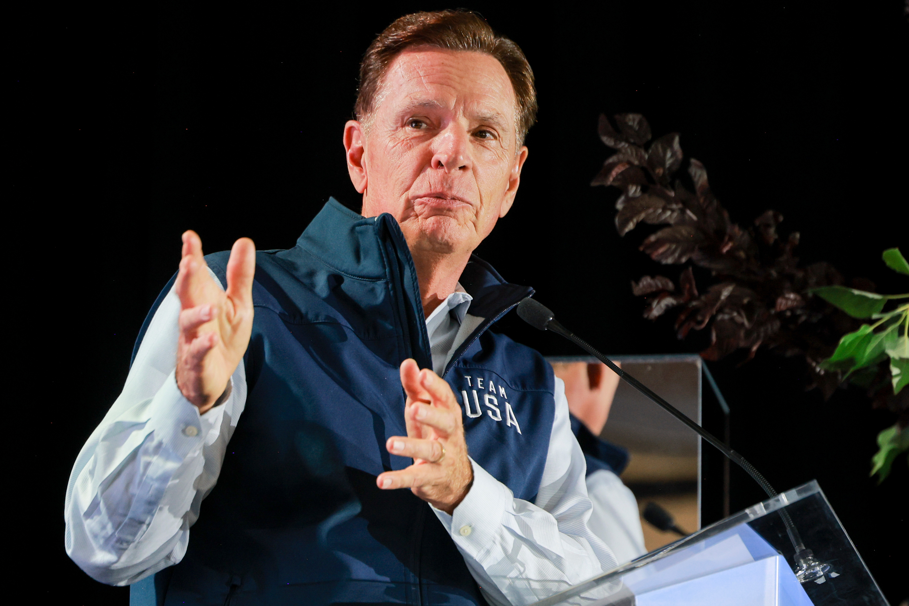 Fraser Bullock, president and executive chair of the Organizing Committee for the 2034 Olympic and Paralympic Winter Games, speaks during the Podium34 press conference at the City Centre Building in Salt Lake City on Monday.