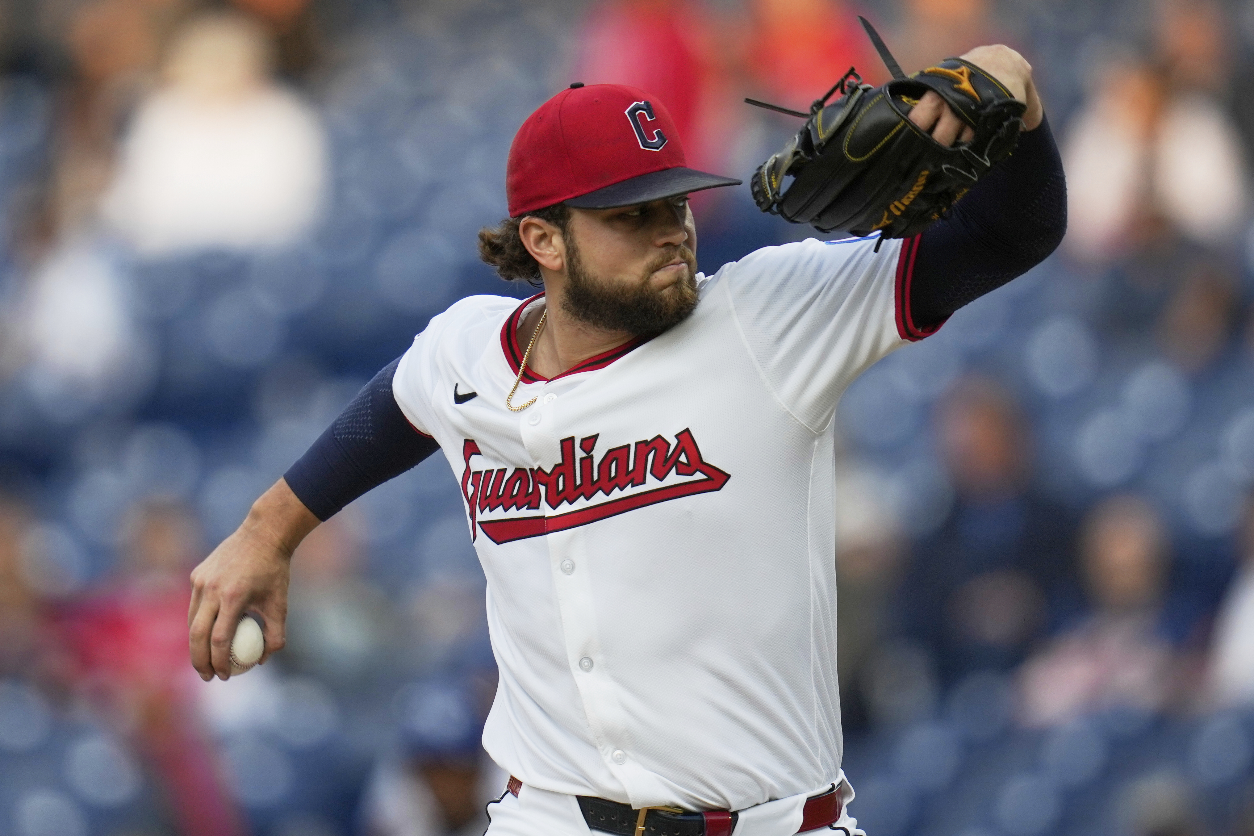 Cleveland Guardians' Slade Cecconi pitches in the first inning of a baseball game against the Kansas City Royals in Cleveland, Monday, Sept. 8, 2025. 