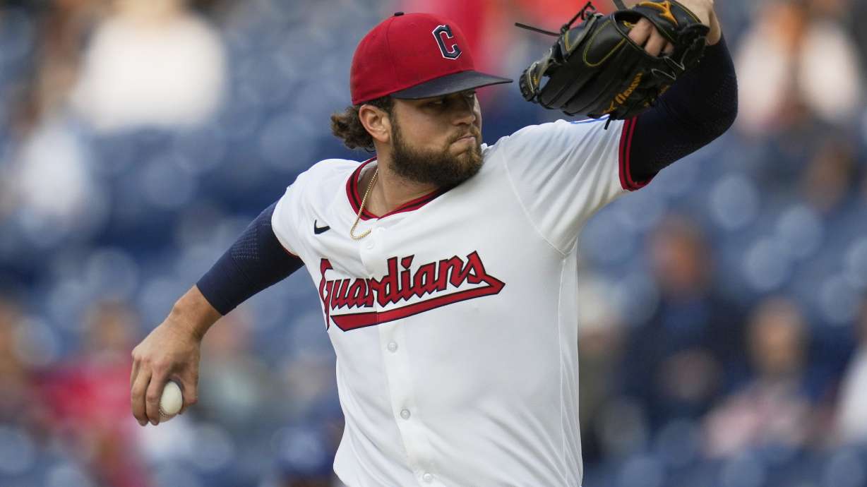 Cleveland Guardians' Slade Cecconi pitches in the first inning of a baseball game against the Kansas City Royals in Cleveland, Monday, Sept. 8, 2025.