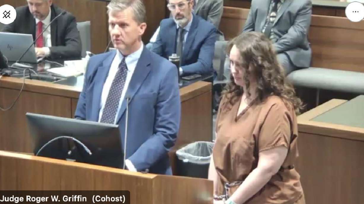 Kathryn Restelli, 37, appears at her sentencing hearing on Tuesday. A judge sentenced her to six years to life in prison after she pleaded guilty to conspiring with her family members to murder her husband.